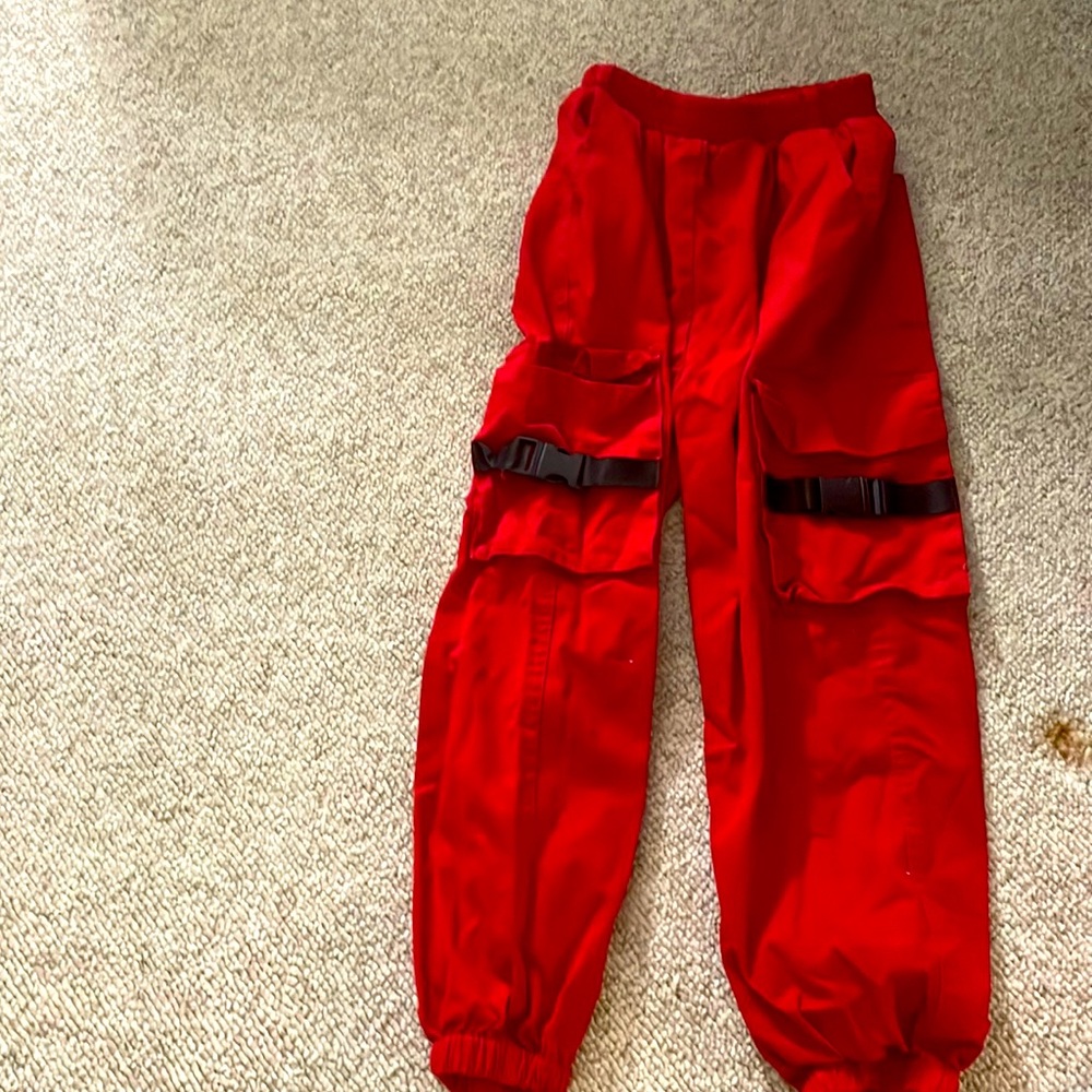 Red buckle pants